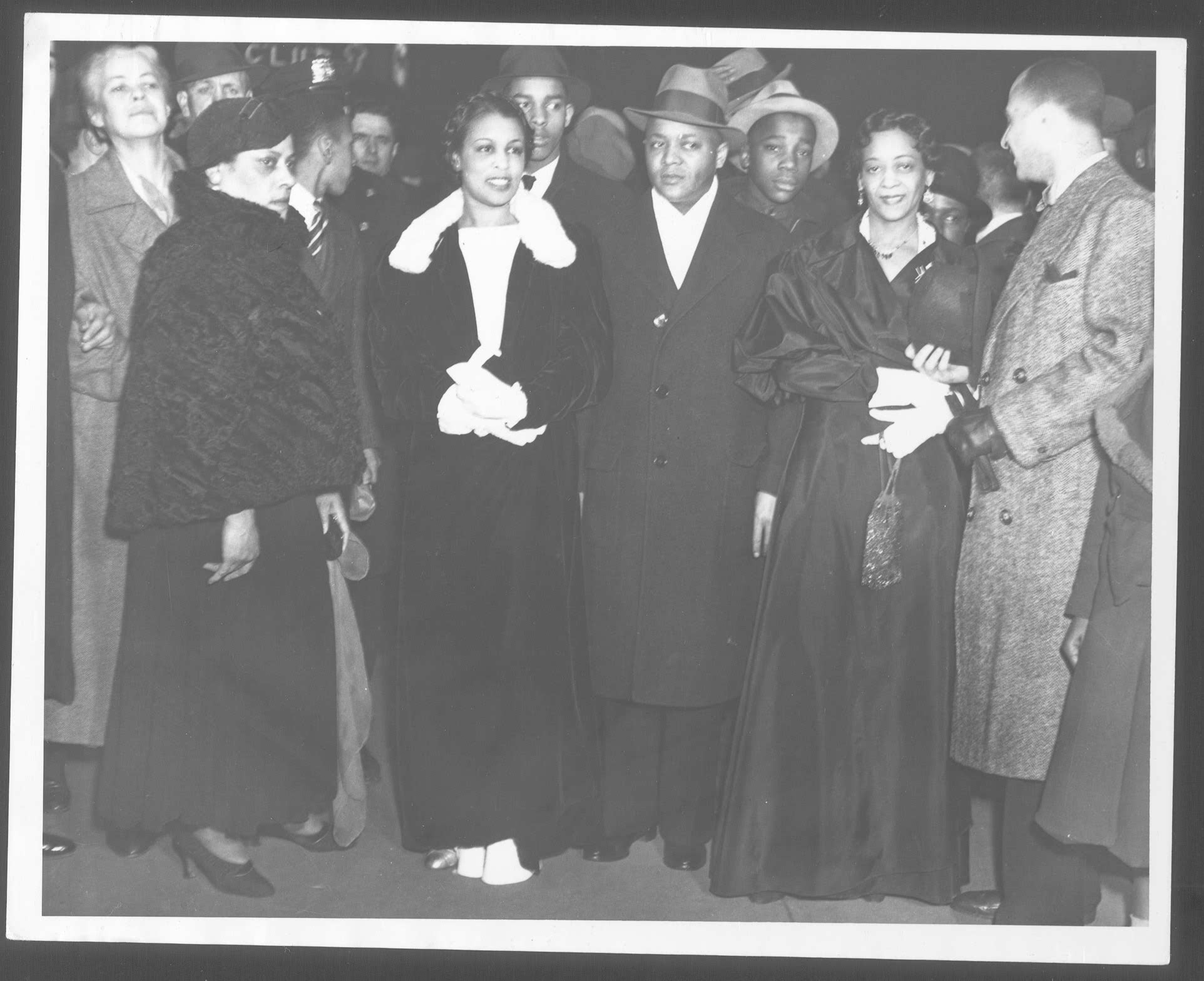 Photograph of Rose McClendon (second from right) and colleagues at an evening performance of the WPA Federal Negro Theatre Unit&#039;s Macbeth.